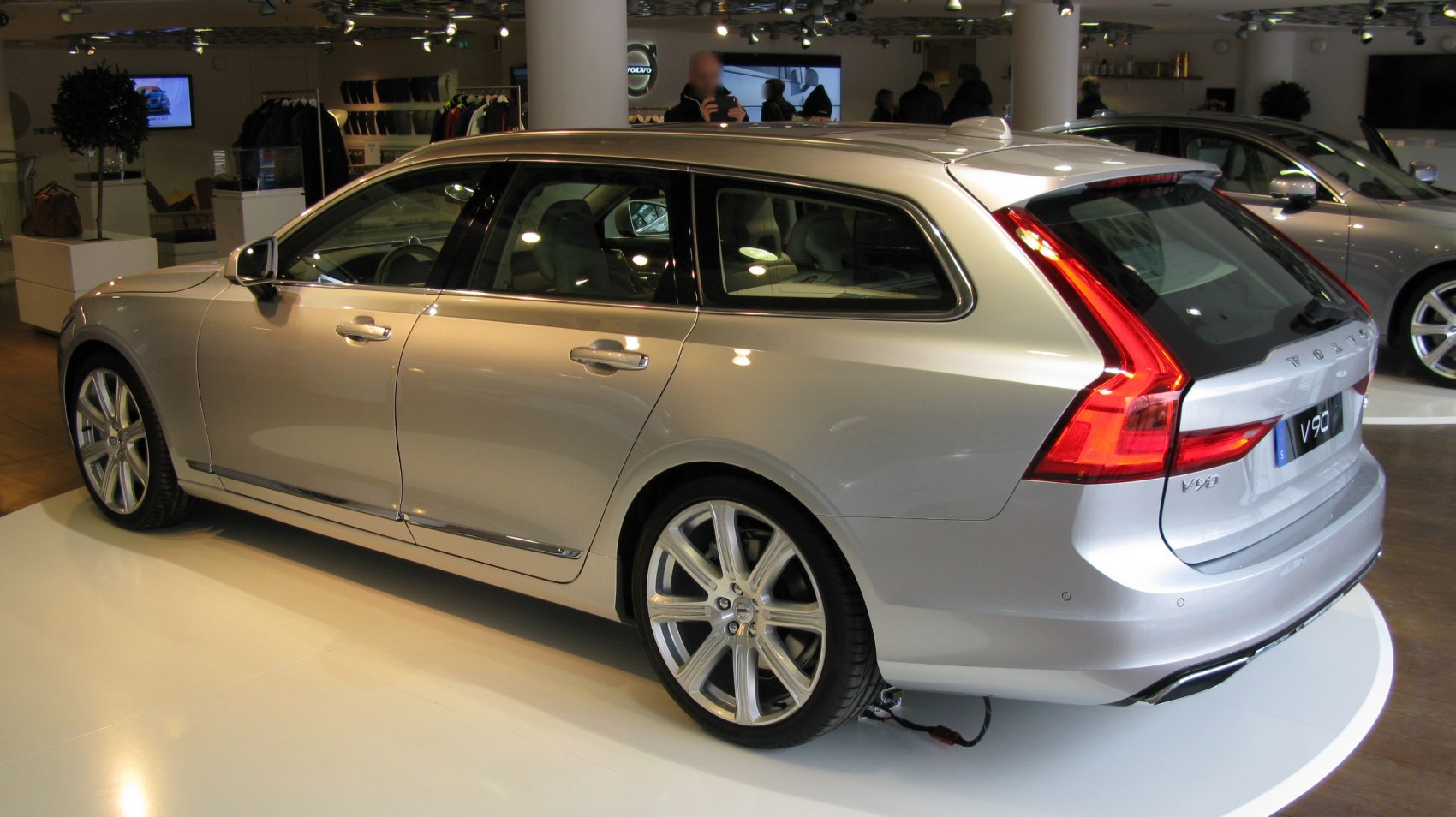 Side and rear view of a modern estate with distinctive tail lights and sleek design