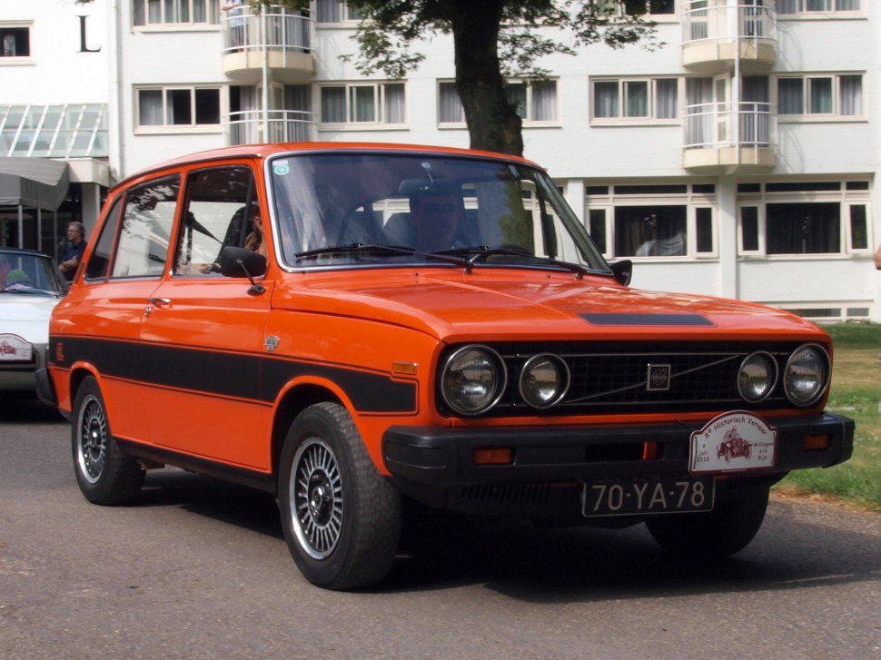 Classic front grille and dual round headlights on vintage station wagon