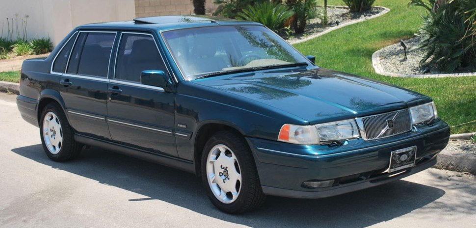 Boxy sedan with distinct front grille and alloy wheels