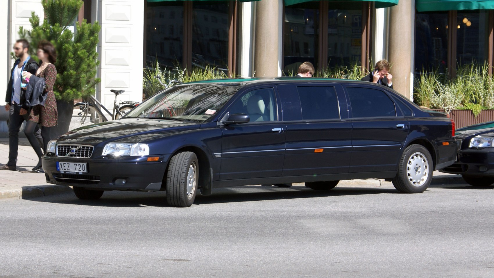 Black stretch limousine with extended body and tinted windows