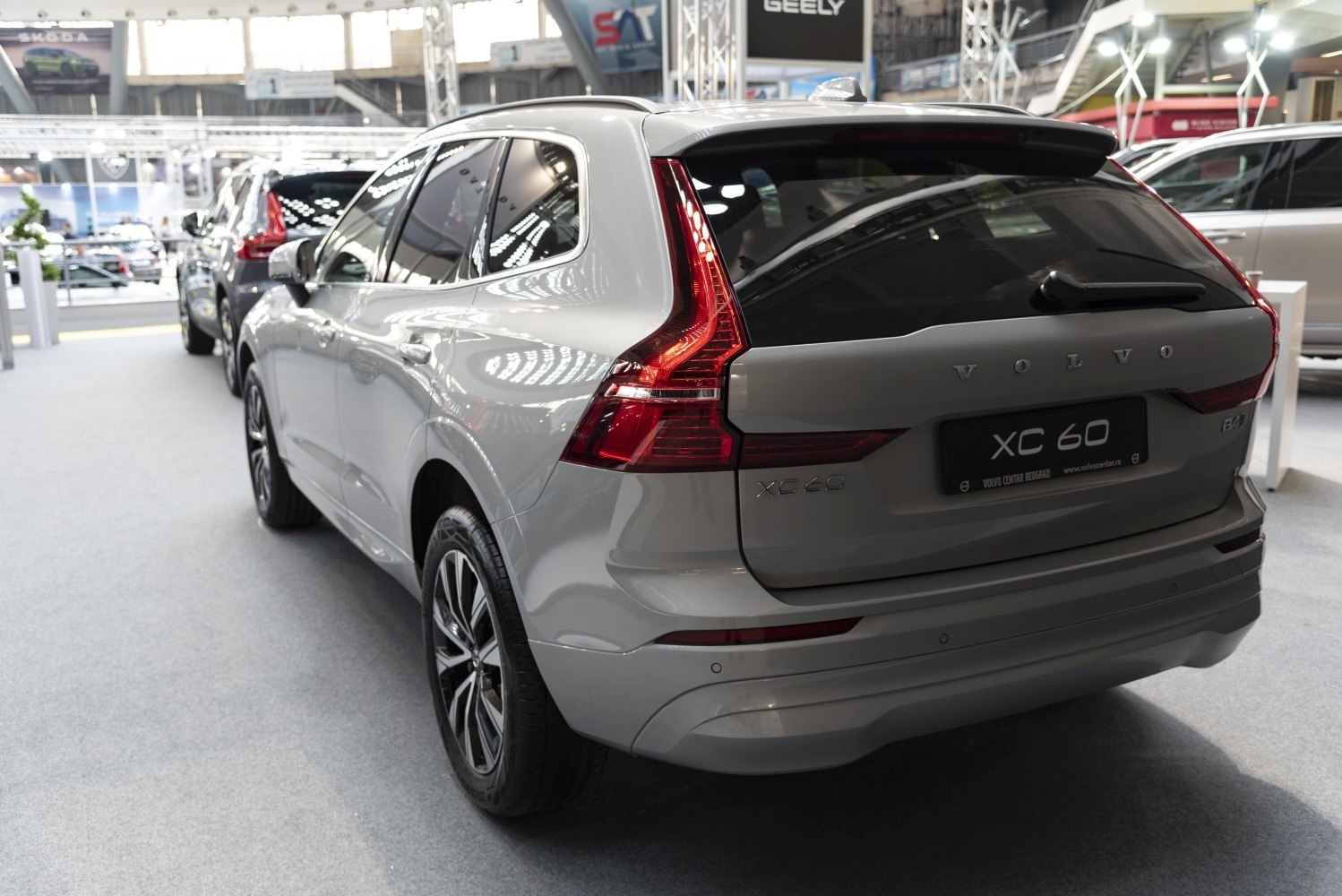 SUV rear view with distinctive L-shaped taillights and alloy wheels