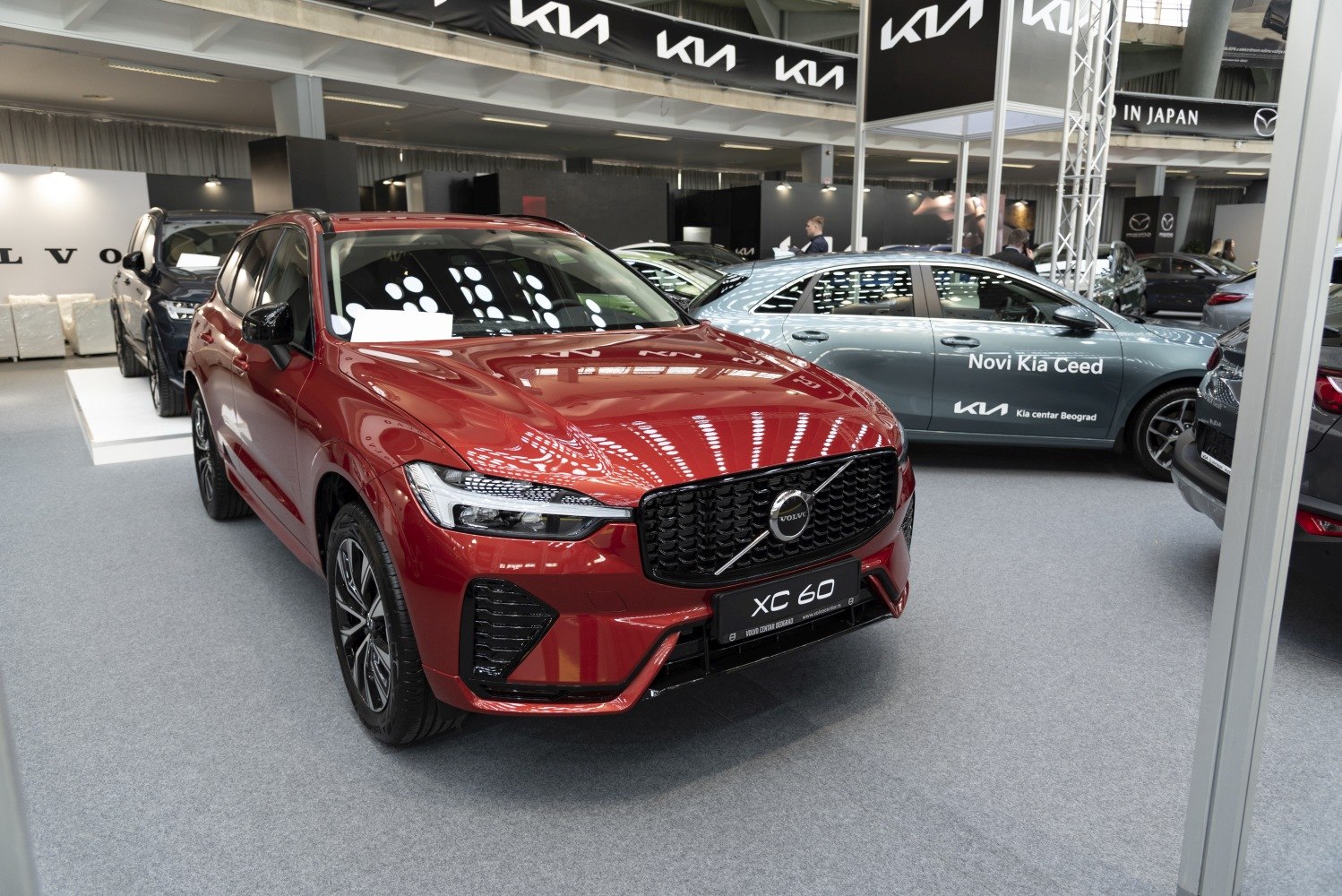Red SUV with bold grille and sleek headlights front view