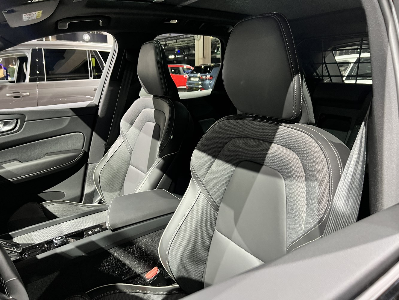 Luxury front seats and center console with detailed stitching