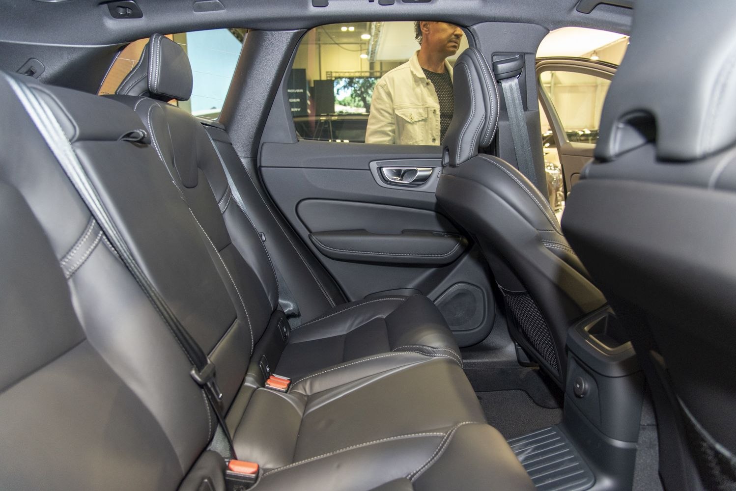 Rear leather seats and door panel with premium stitching
