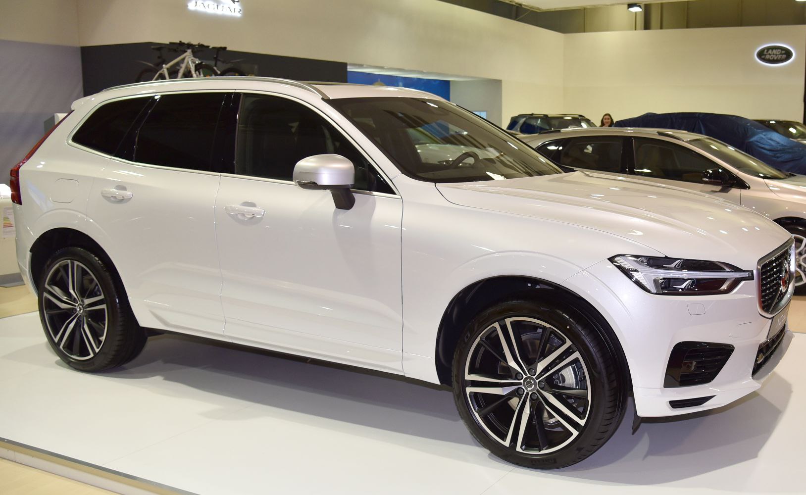 White SUV side profile with sleek design and alloy wheels