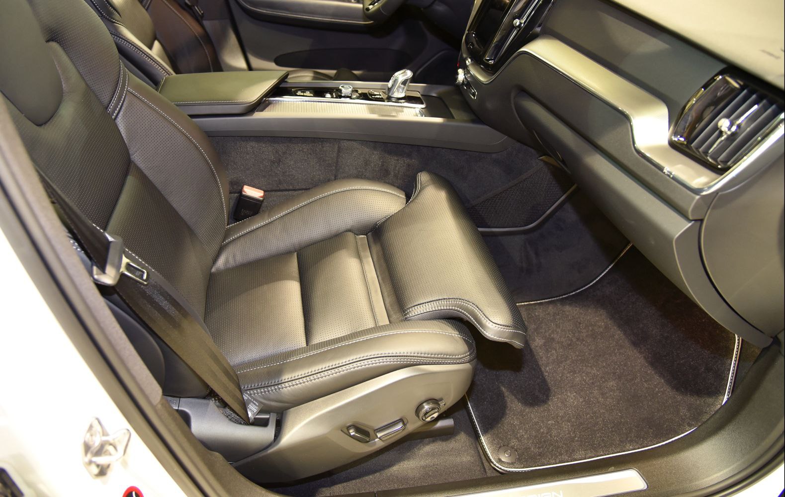 Leather front passenger seat with adjustable footrest and premium interior trim