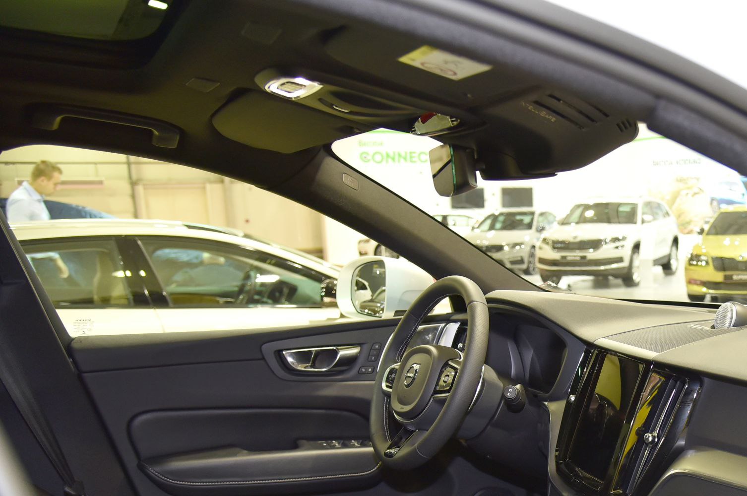 Interior steering wheel and dashboard with modern design elements