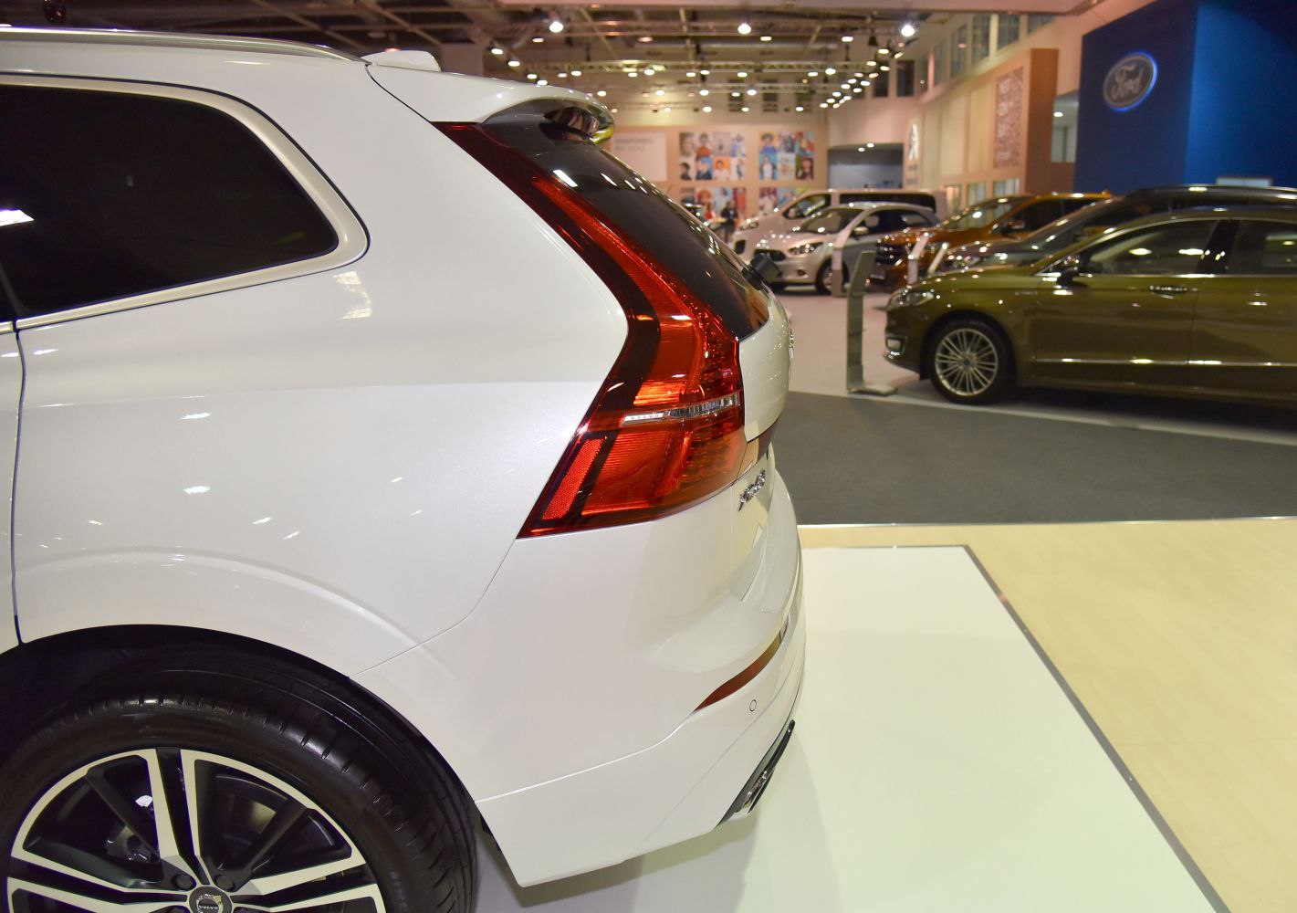 Close-up on rear tail light and wheel design of a modern SUV