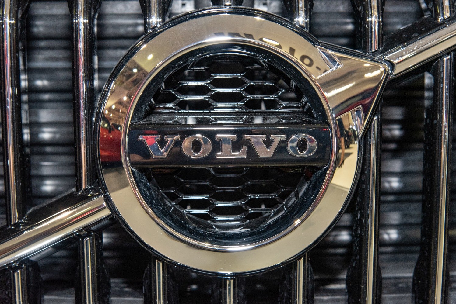 Close-up of Volvo car grille with metallic logo