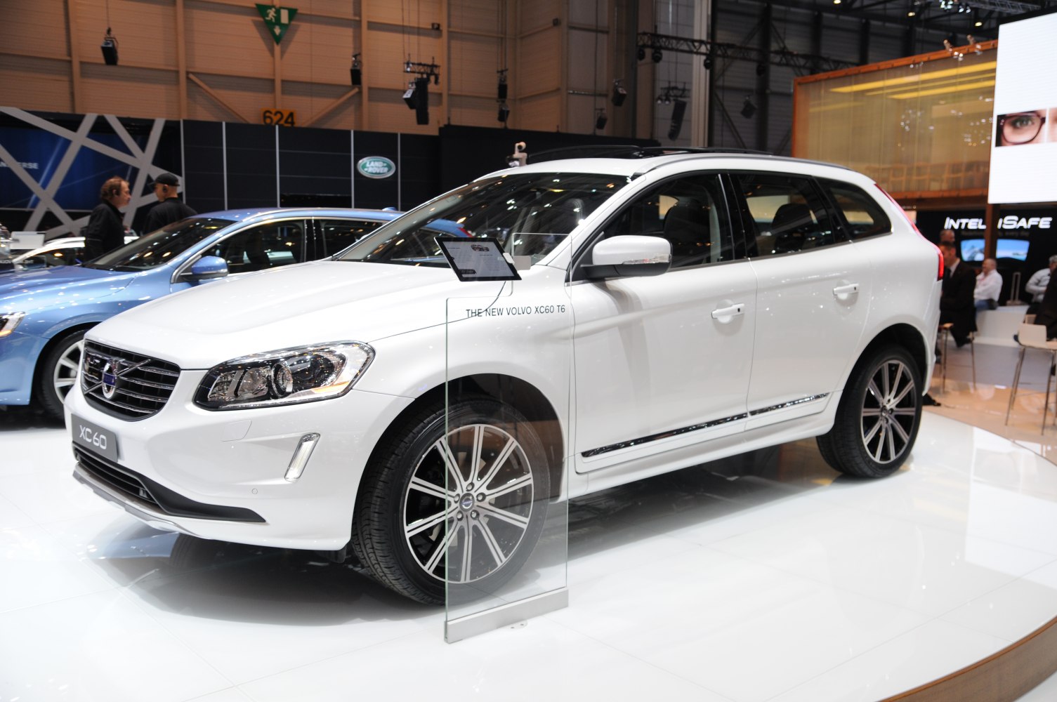 White midsize SUV with LED headlights and alloy wheels