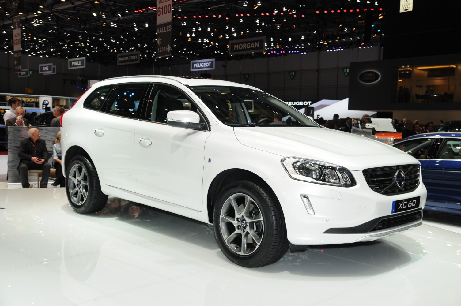 White SUV front and side view with alloy wheels