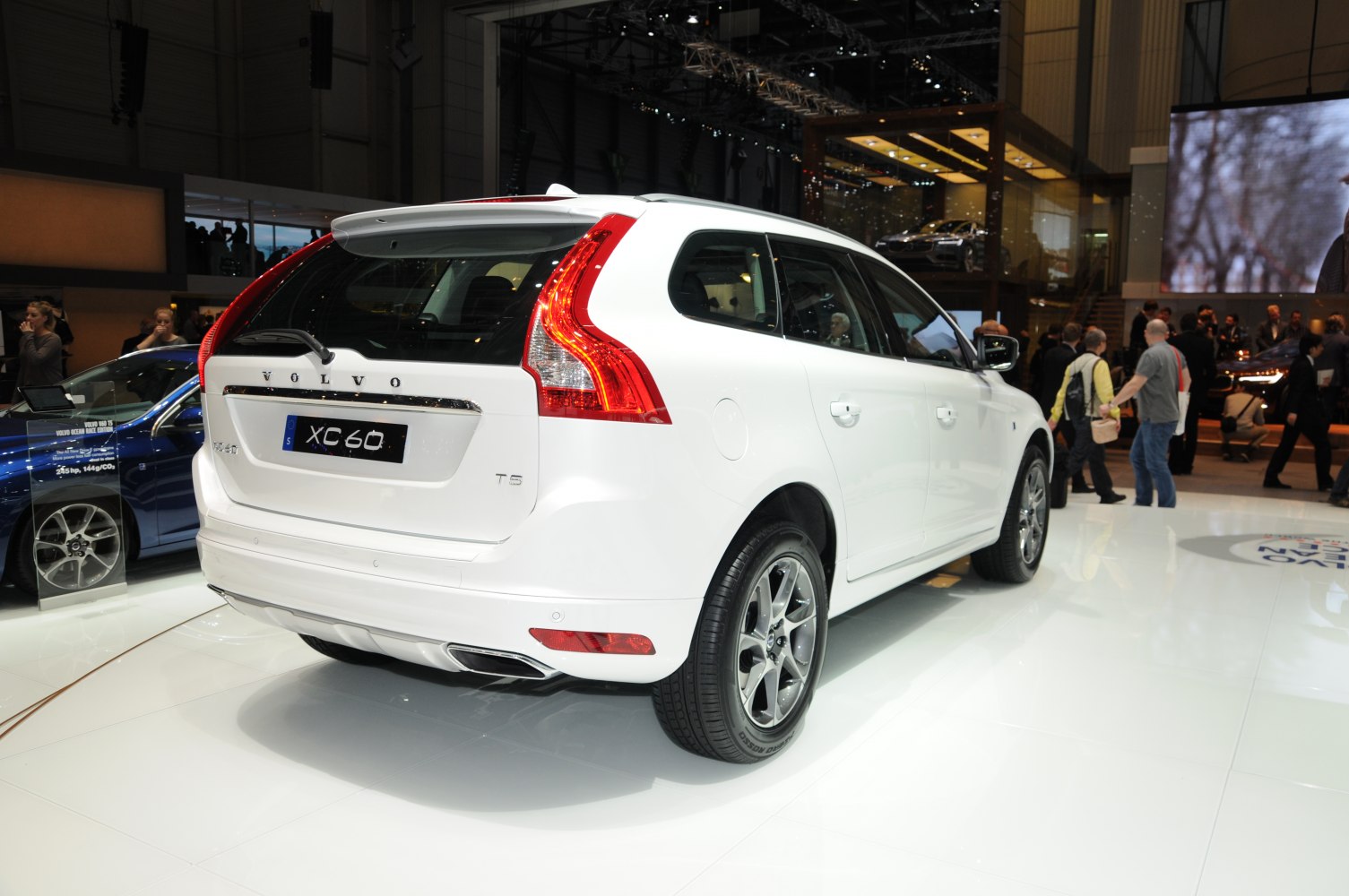 Rear design with distinctive taillights and dual exhaust on white SUV