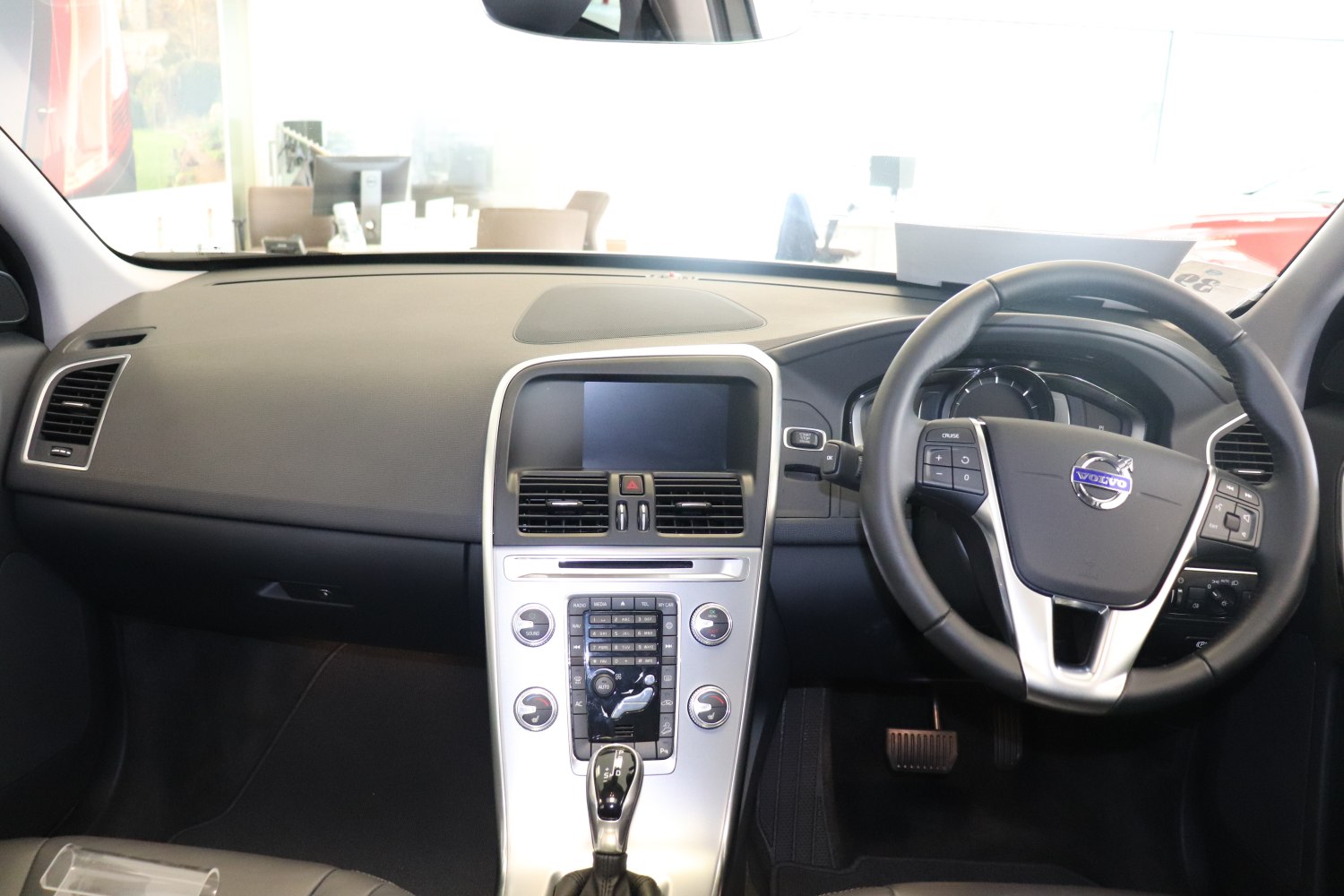 Center console and multifunction steering wheel in a modern car interior