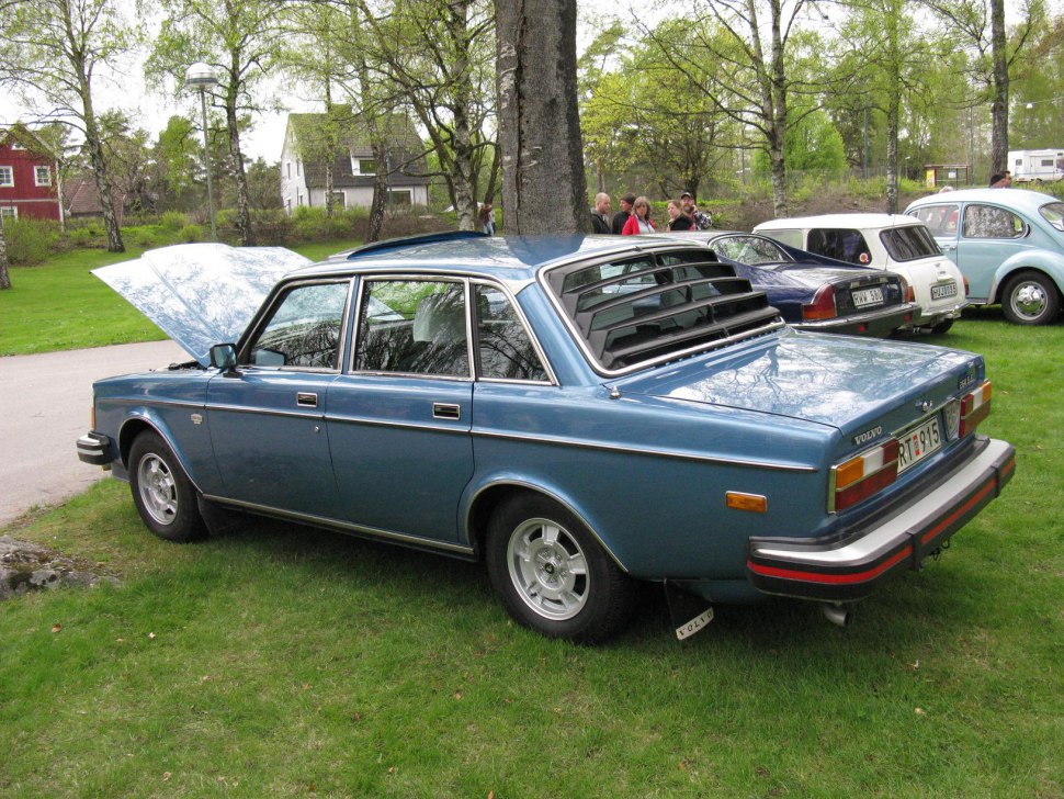 Vintage sedan with distinctive rear window louvers and classic 1970s styling.