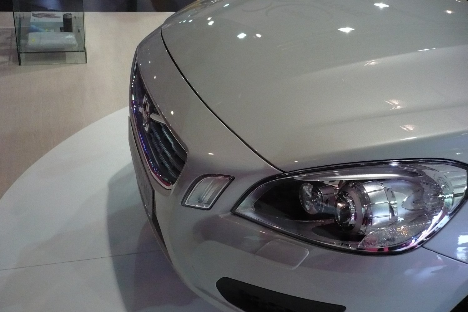 Close-up of front headlight and grille