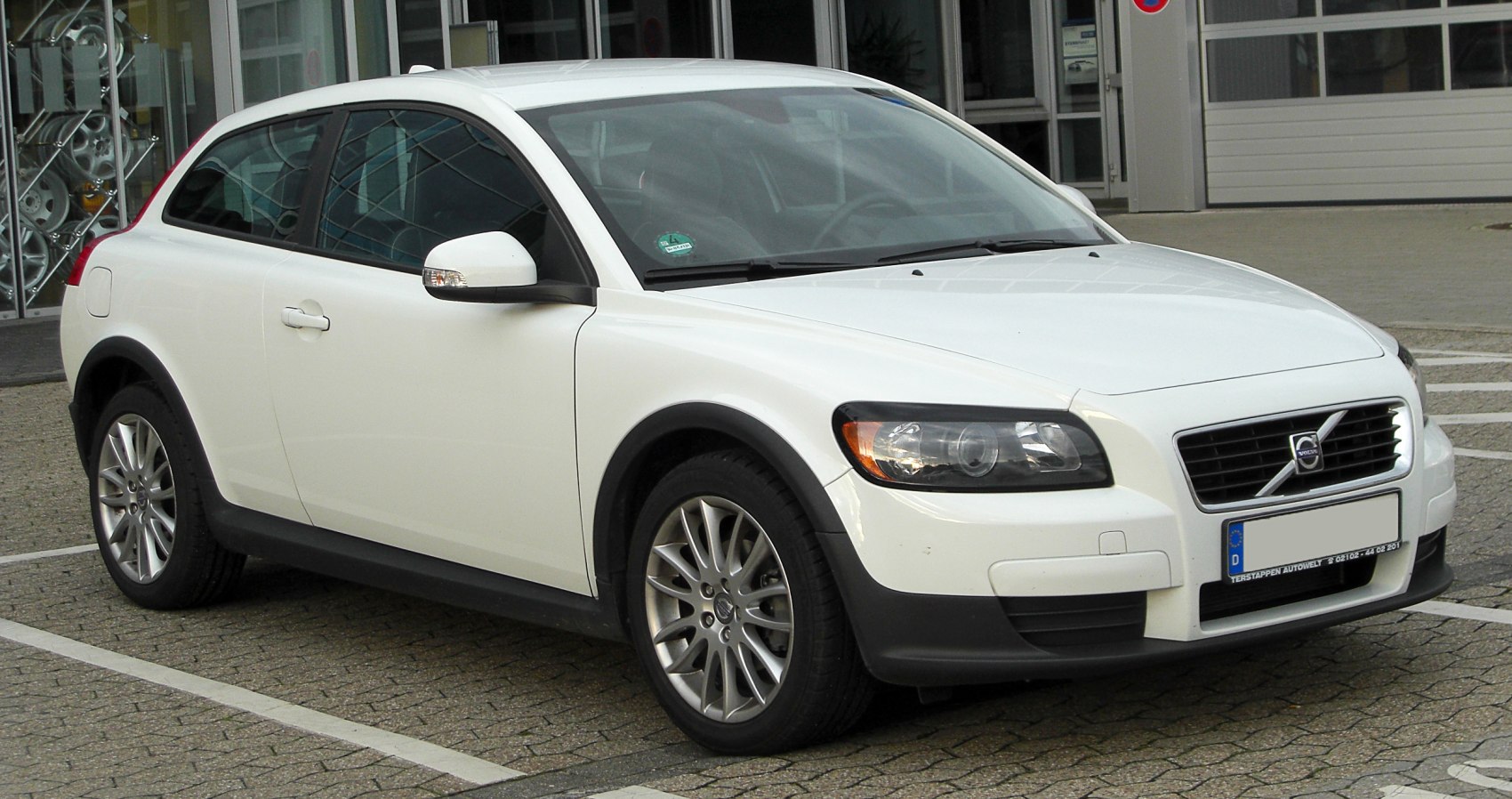 Sporty three-door hatchback with alloy wheels and front headlights