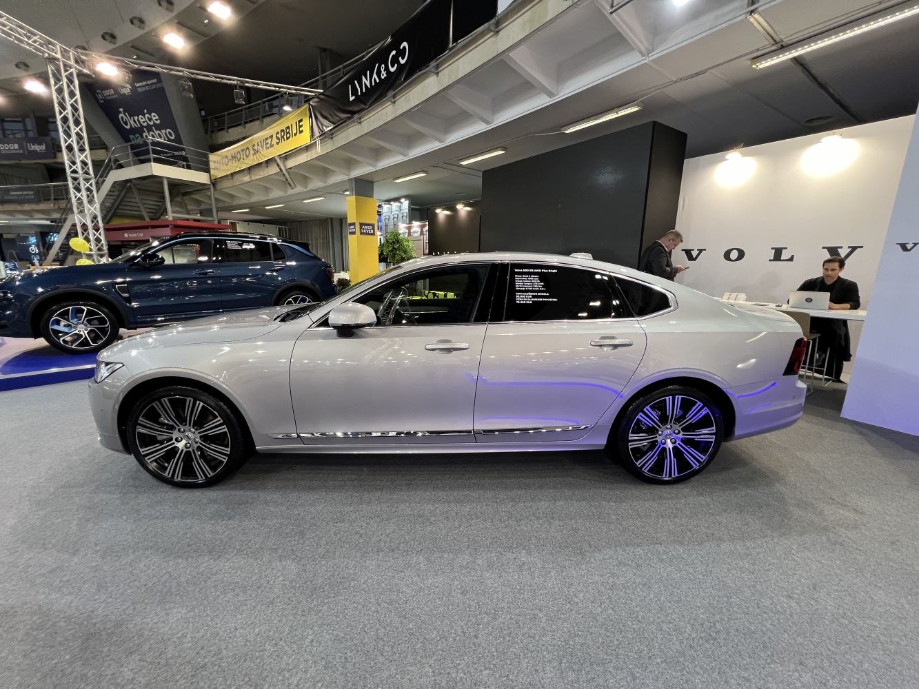 Side profile of a luxury sedan with alloy wheels