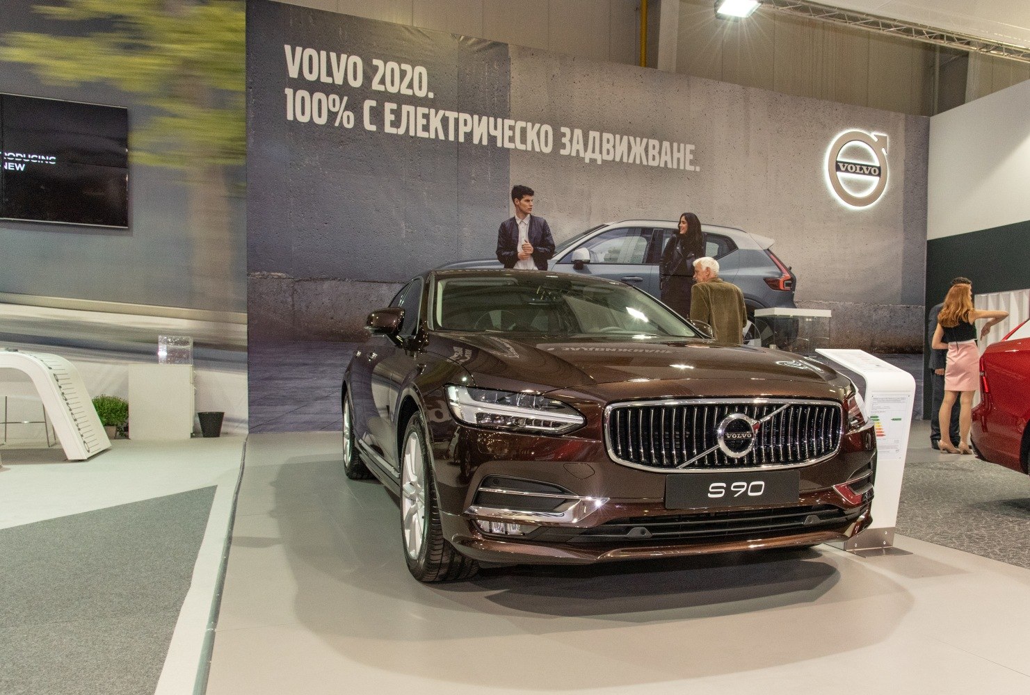 Front view of luxury sedan featuring distinct grille and headlights