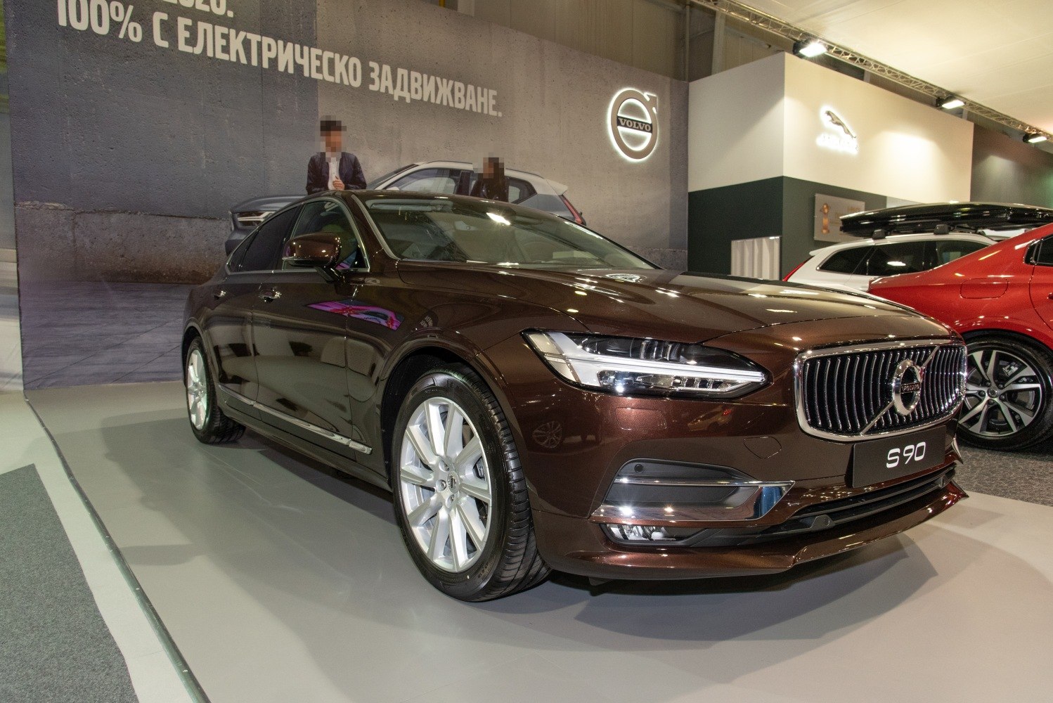 Luxury sedan with chrome grille and LED headlights