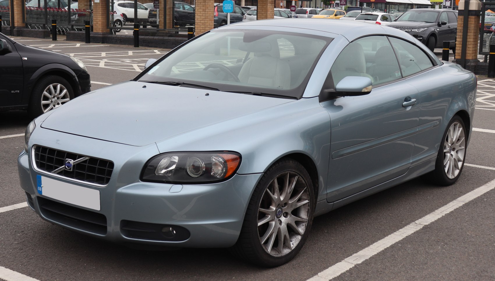 Light blue coupe with sharp headlights and alloy wheels