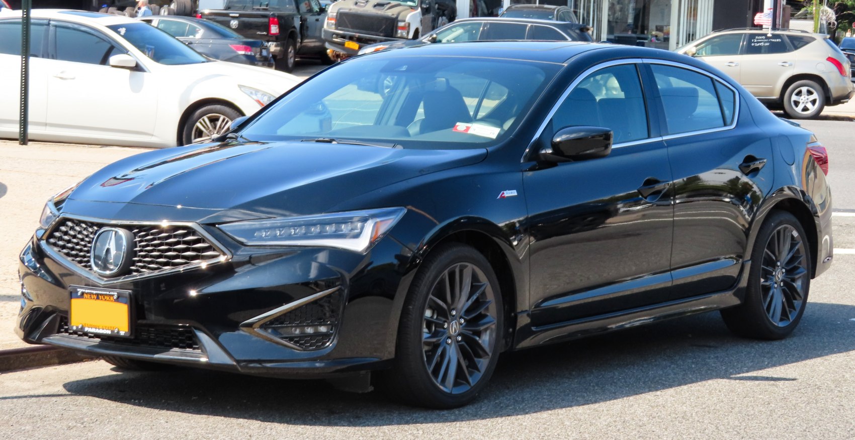 Front grille and LED headlights of sleek sporty sedan