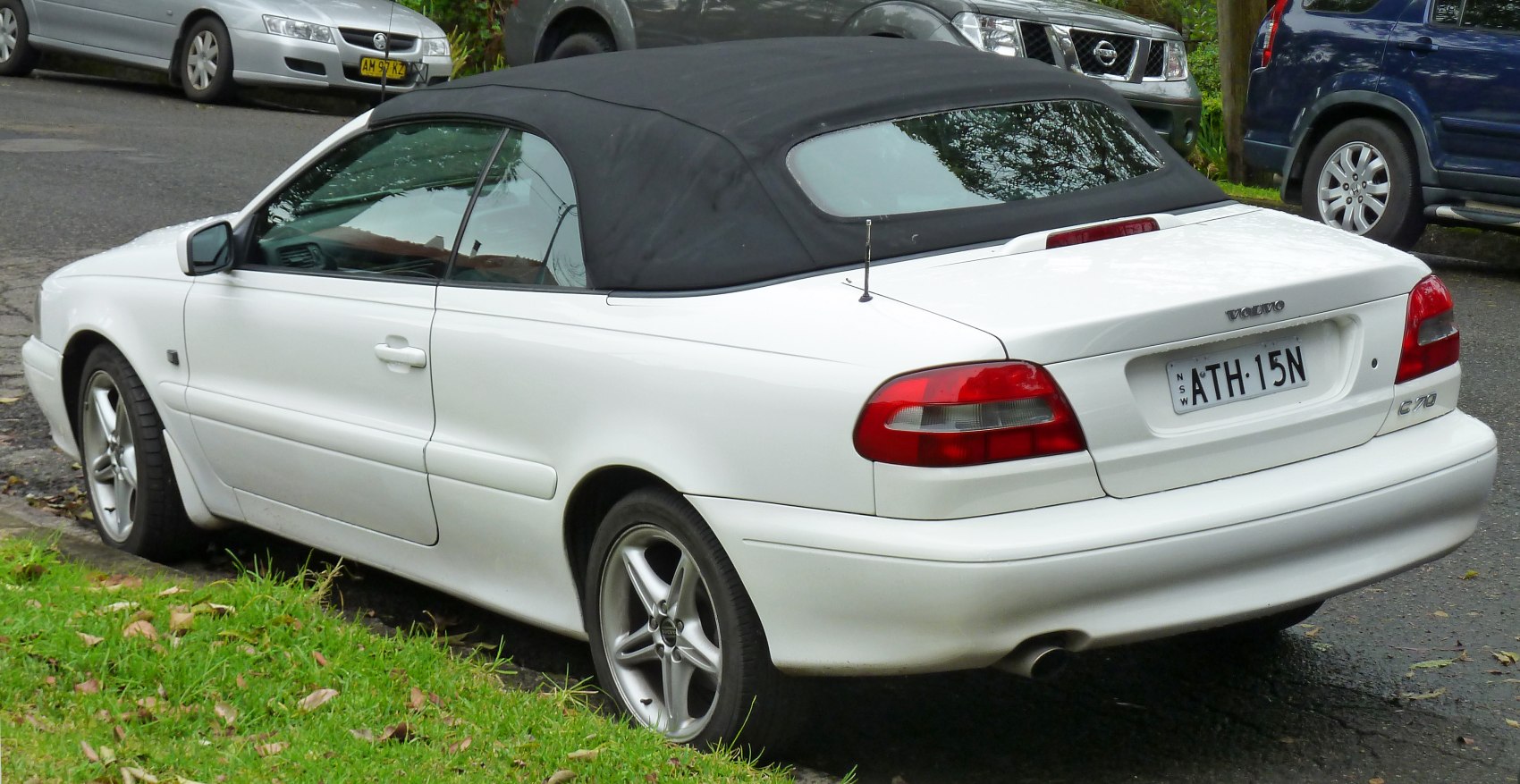 Convertible with black fabric soft top and alloy wheels