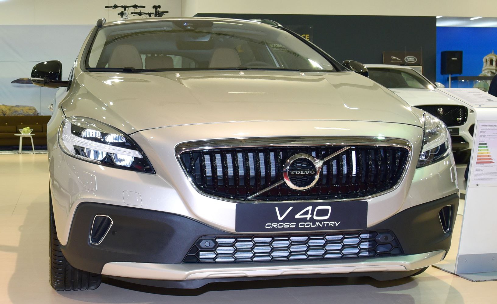 Front view with grille, LED headlights, and bumper design