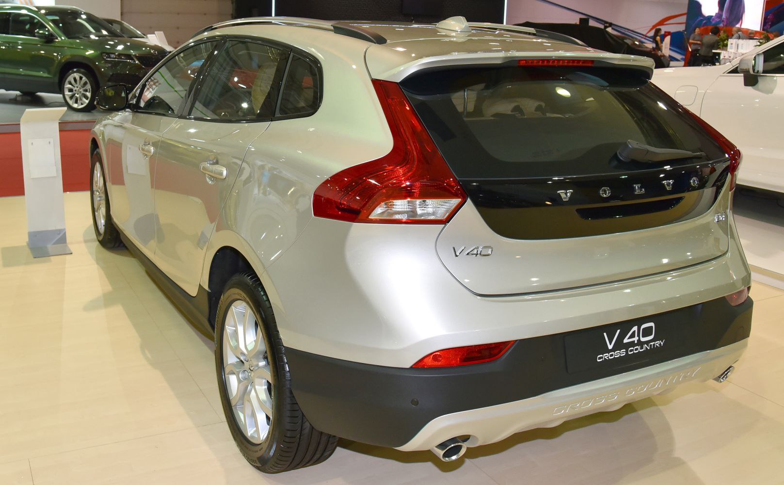 Sporty rear hatchback view with LED tail lights and alloy wheels.