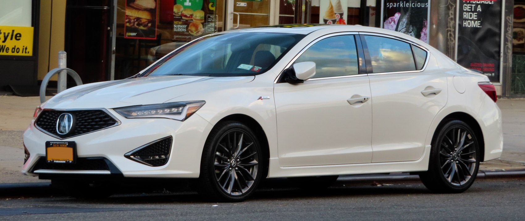 Sleek front and side profile with LED headlights and alloy wheels