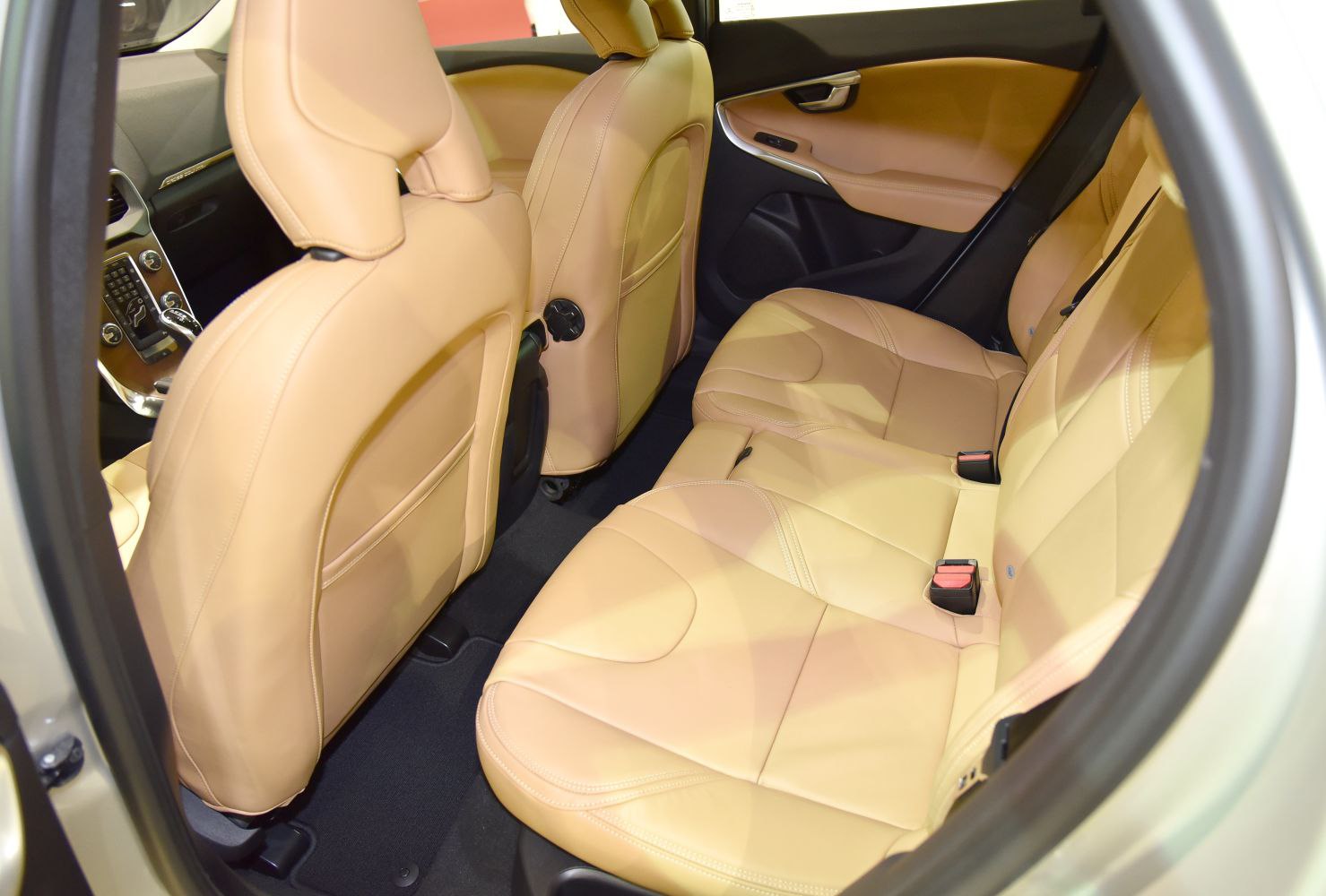 Rear seat tan leather upholstery and spacious rear cabin area