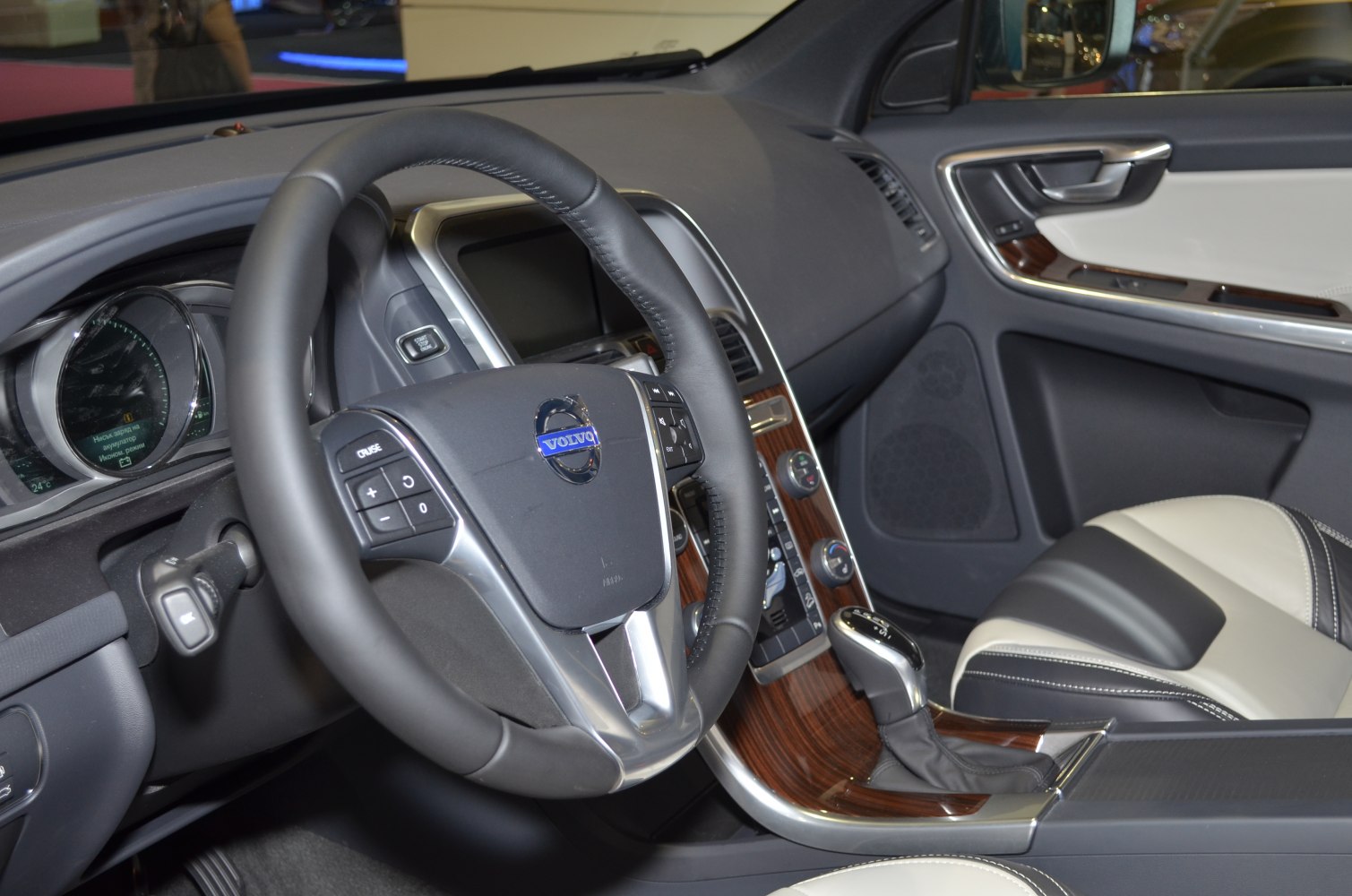 Dashboard, steering wheel, wood trim inside vehicle