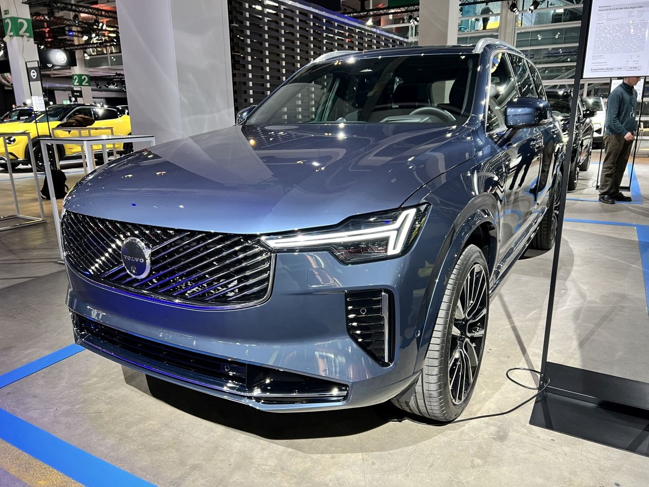 Front view of luxury SUV with LED headlights and distinctive grille