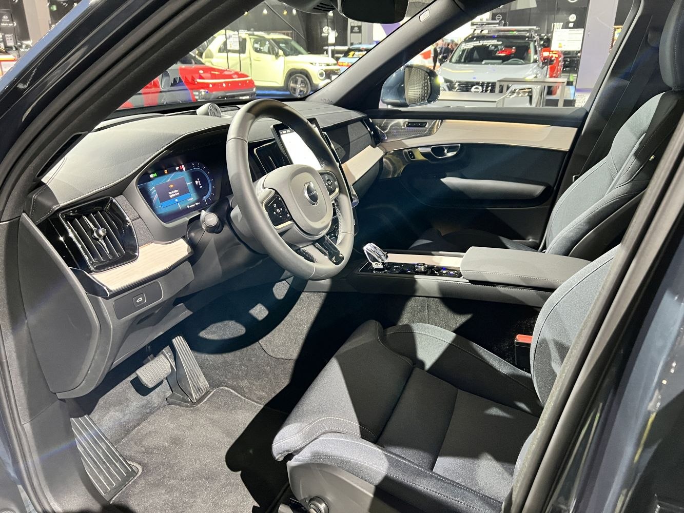 Dashboard with digital instrument cluster and modern center console with crystal gear lever