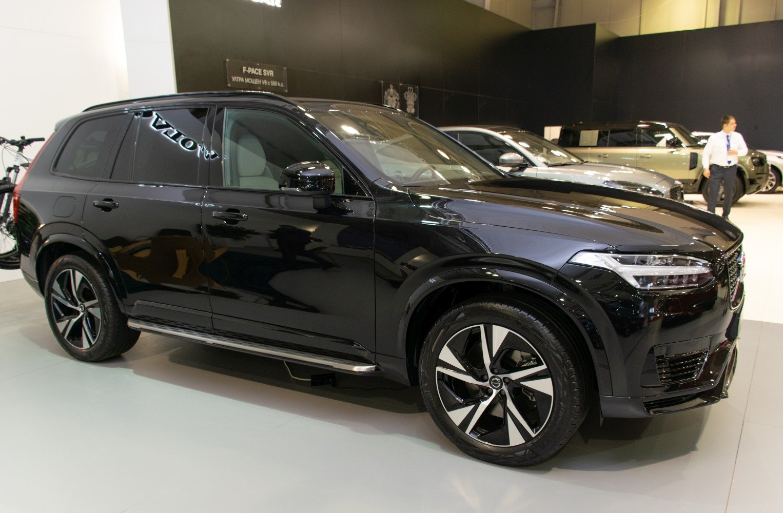 Black luxury SUV with modern alloy wheels and sleek side profile