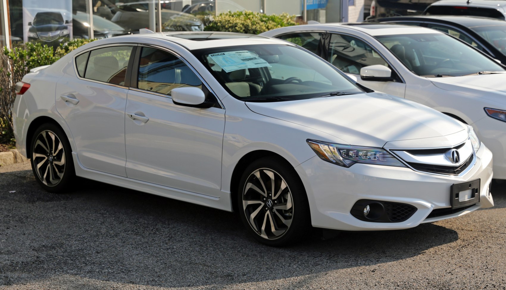 Sleek front side shot with alloy wheels and LED headlamps