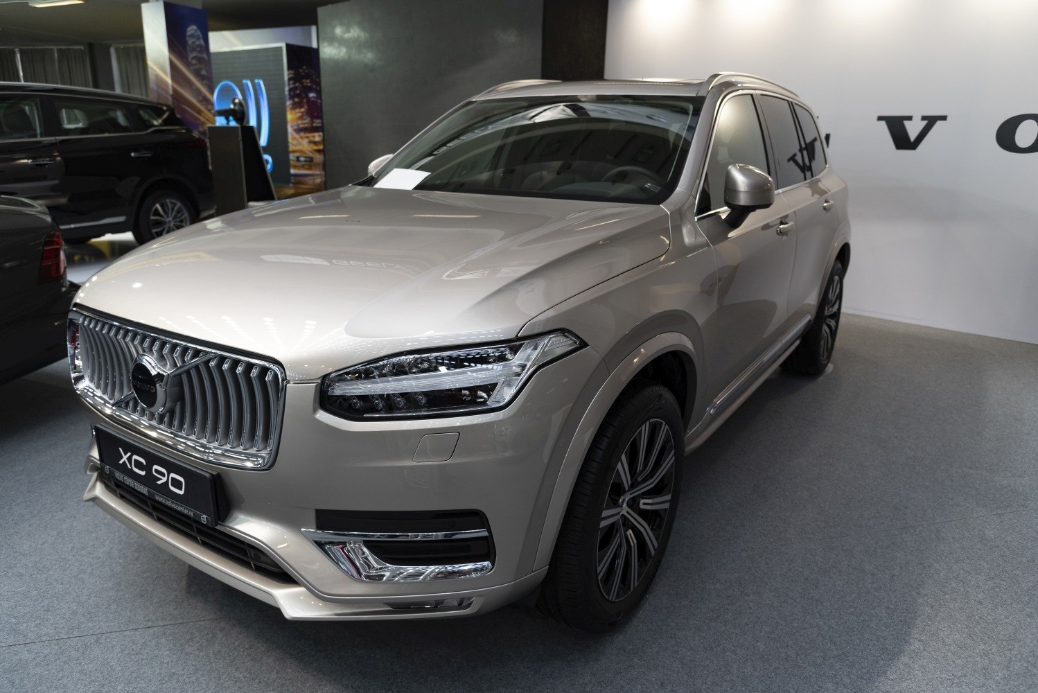 Front view with signature grille and LED headlights