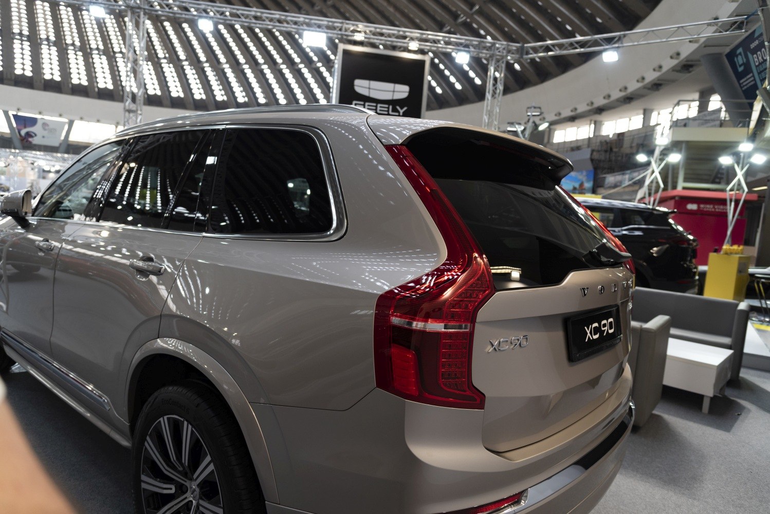 Rear close-up featuring taillight and tinted rear window.