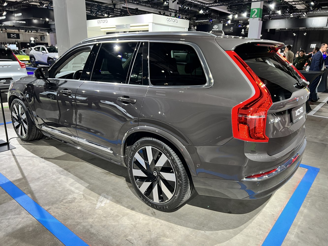 Rear side profile with distinctive vertical tail lights and alloy wheels