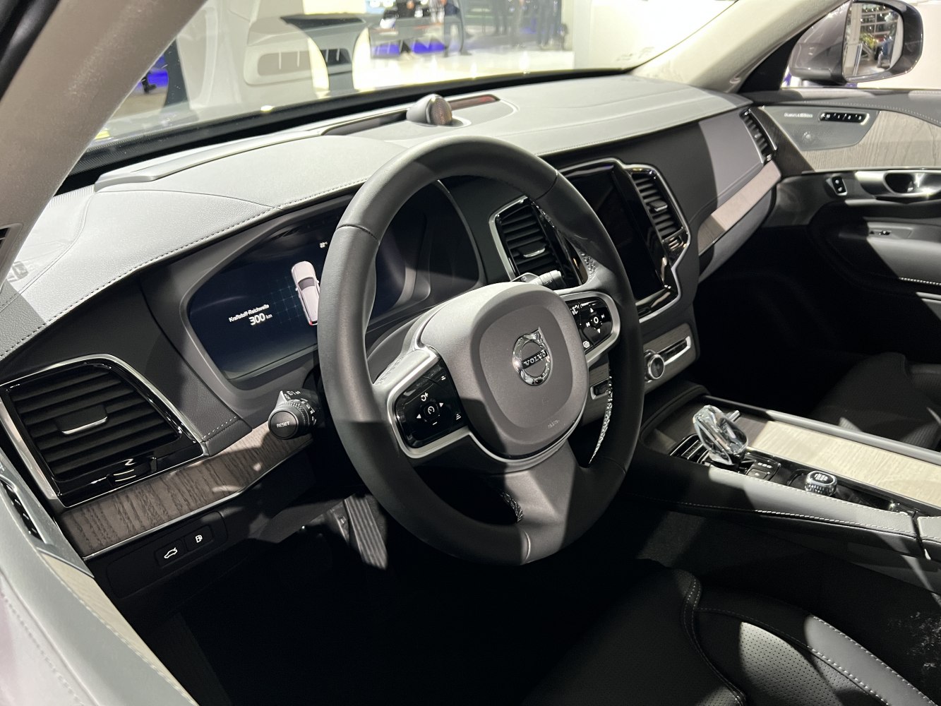 Modern car interior with digital dashboard and multifunction steering wheel