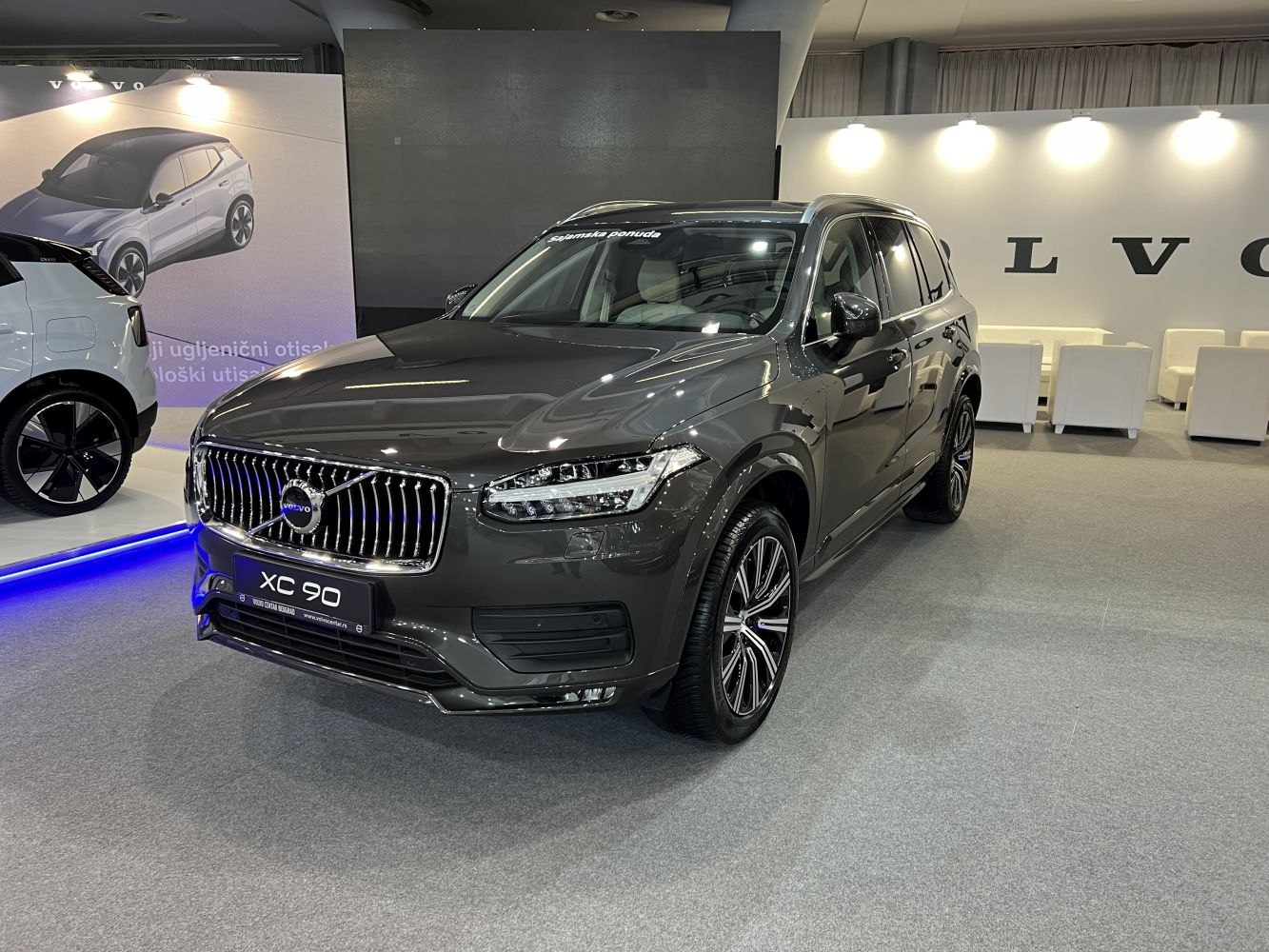 Front view of sleek SUV with LED headlights and bold grille