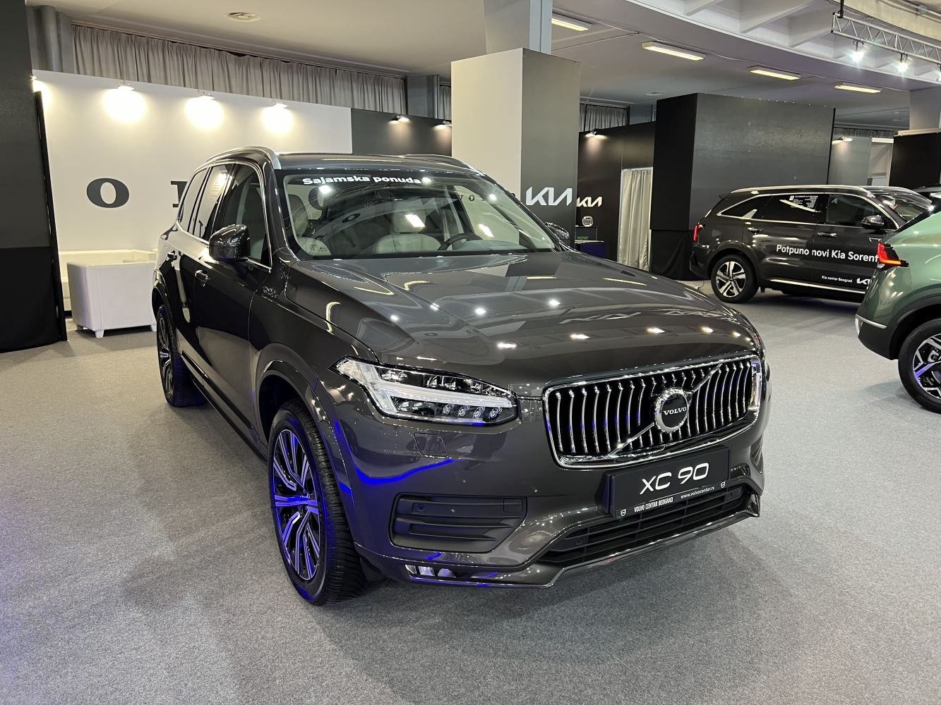 Front view of luxury SUV with LED headlights and vertical chrome grille