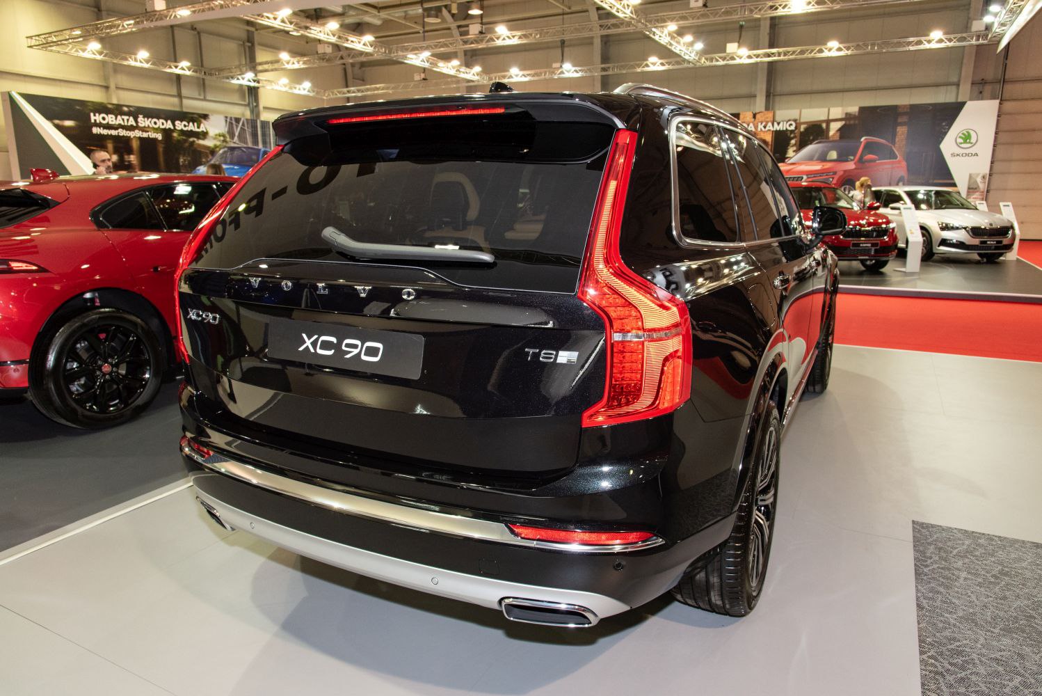 Rear view of an SUV with distinct vertical LED taillights and dual exhaust tips.
