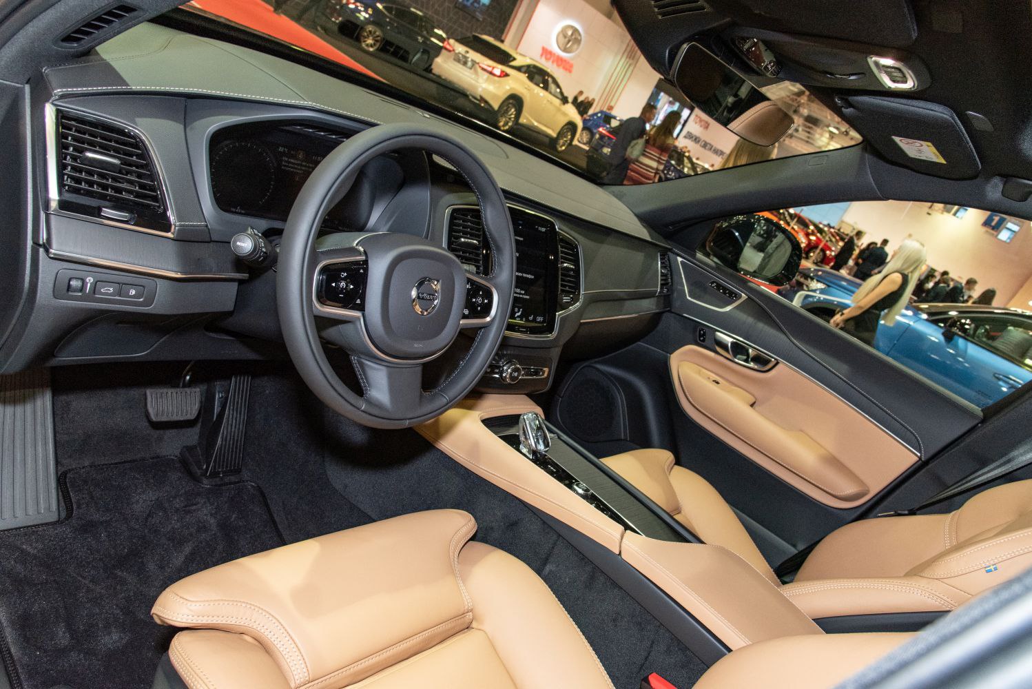 Luxury car interior with leather seats and a modern dashboard
