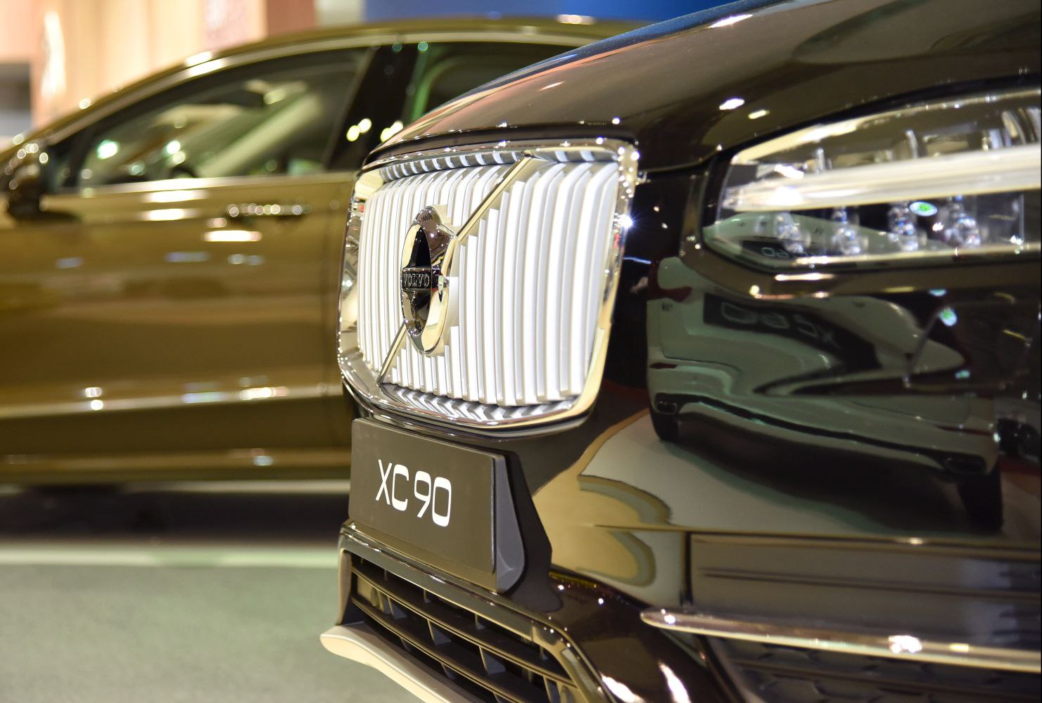 Close-up of front grille and LED headlights on a modern SUV
