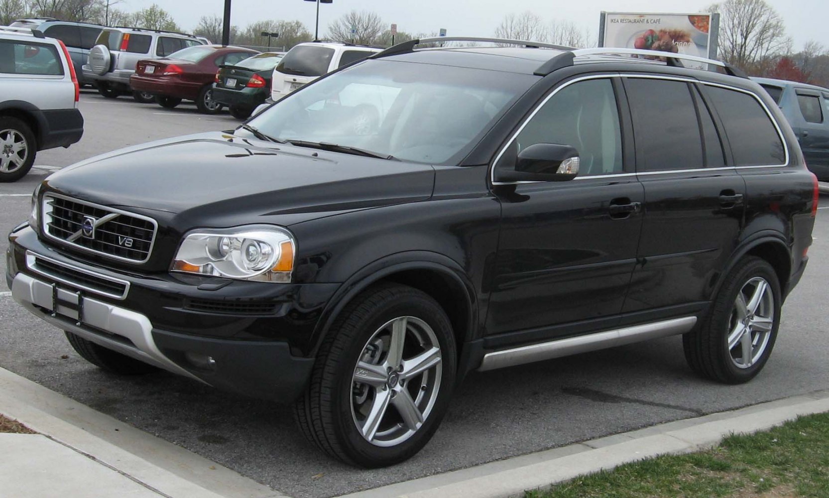 Black luxury SUV with V8 badge and facelifted grille design