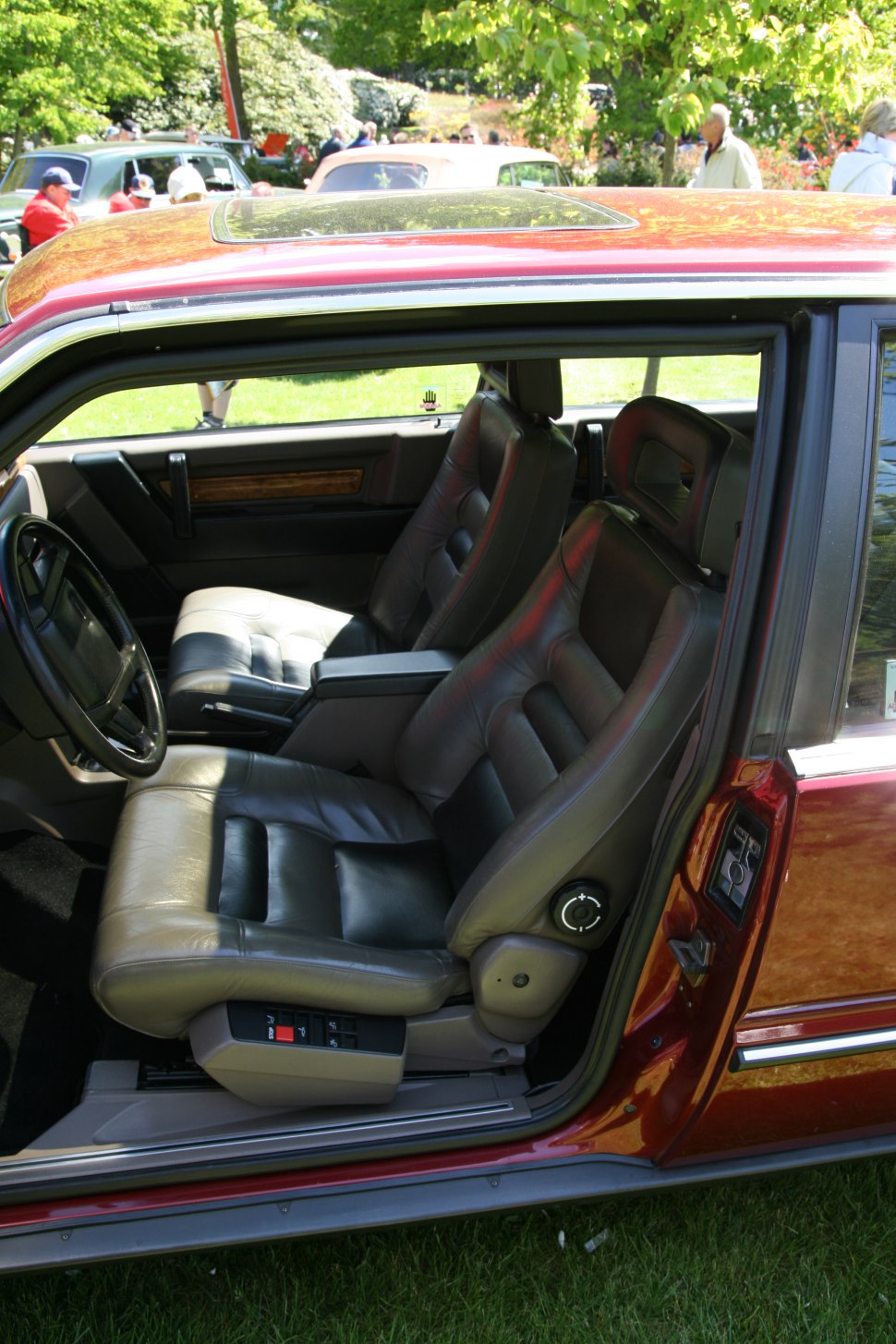 Leather seats and sunroof with power seat adjustment controls