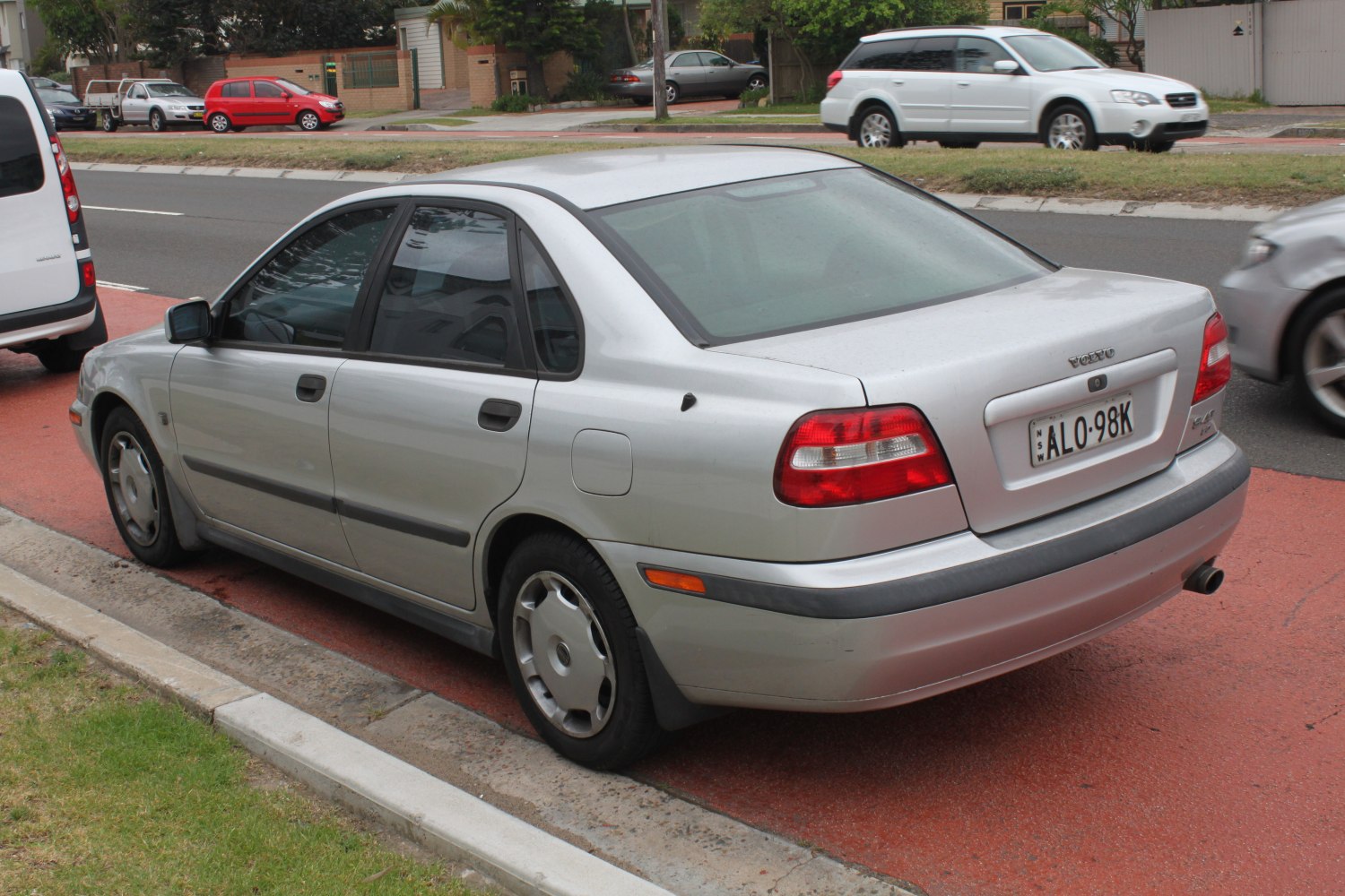 Rear side of a 1996 sedan with distinctive taillights and trunk design