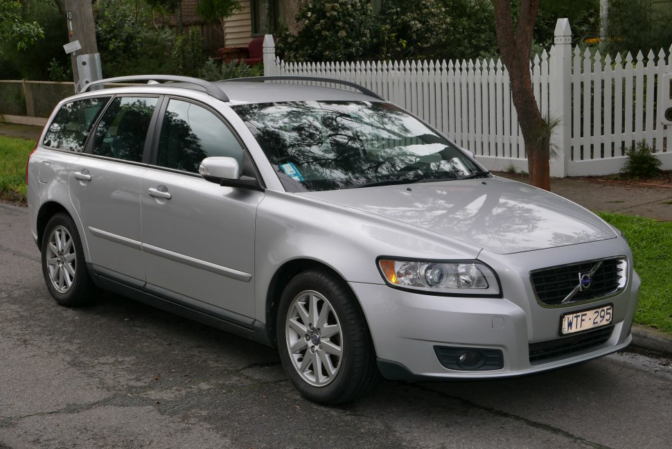 Silver station wagon with roof rails and alloy wheels