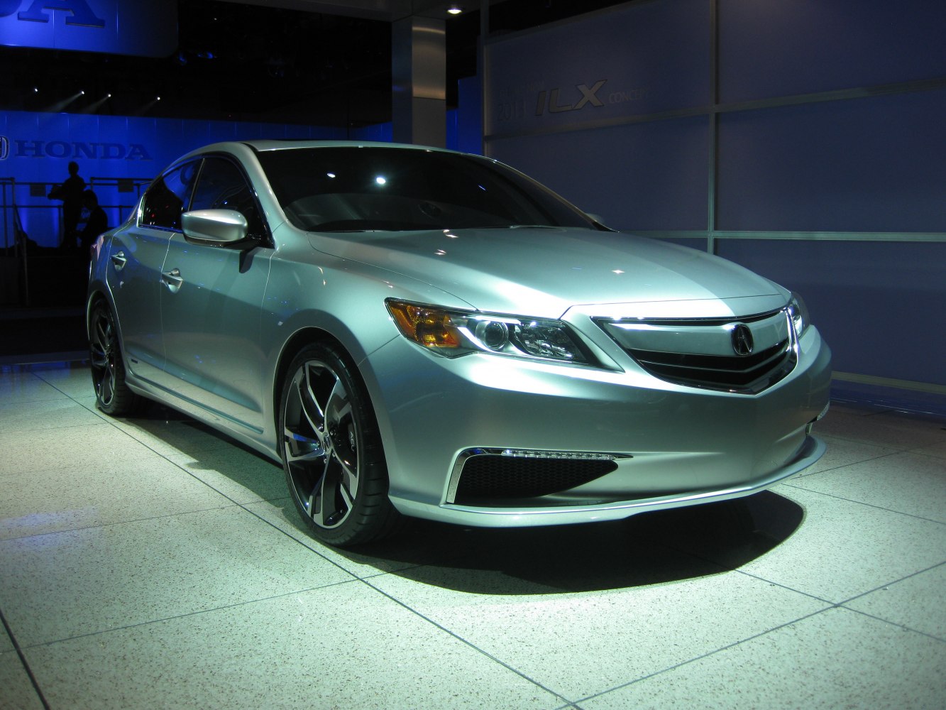 Front-angle view with alloy wheels and LED headlights