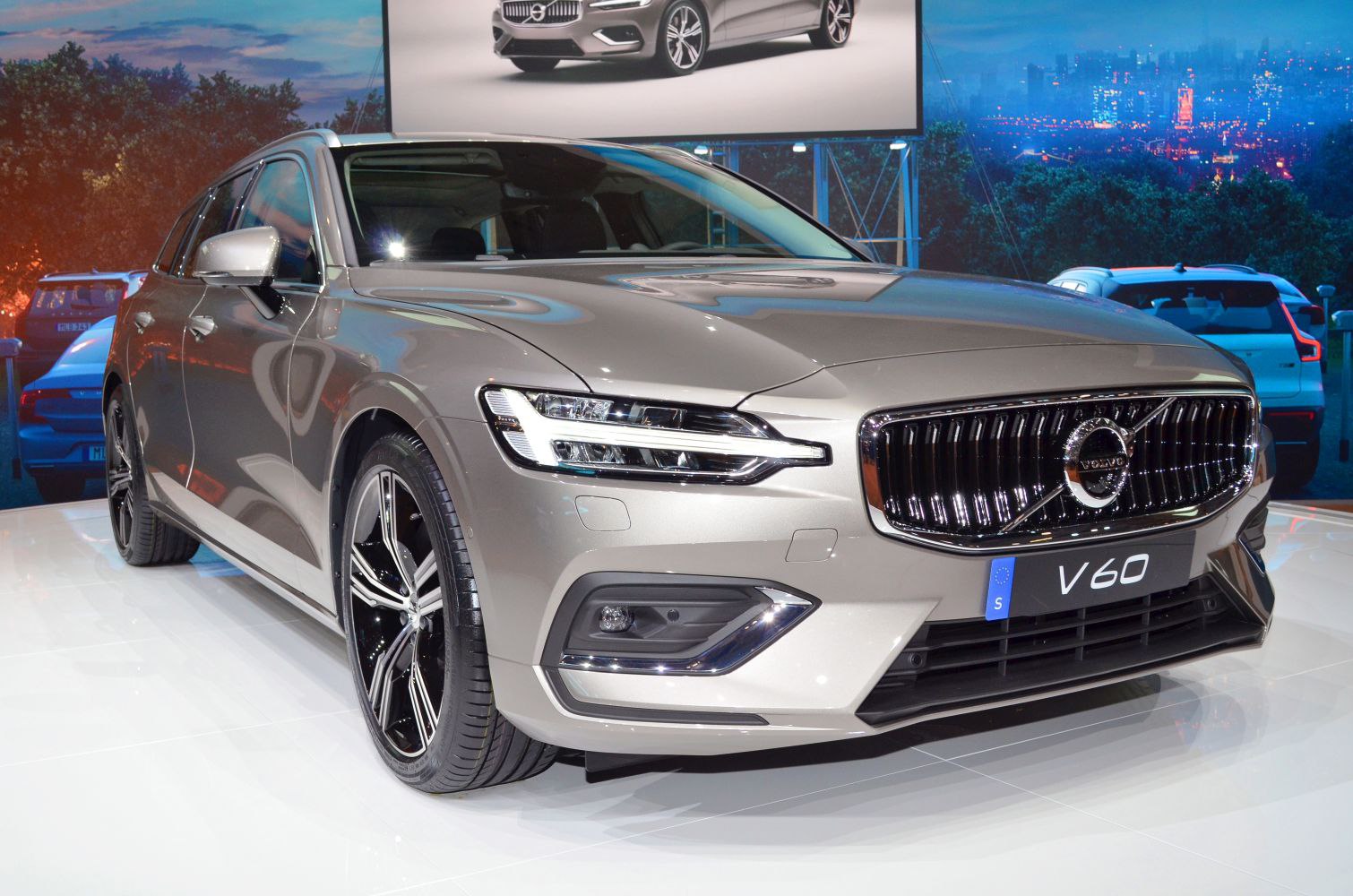 Front LED headlights and large chrome radiator grille with modern alloy wheels